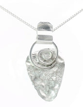 Load image into Gallery viewer, Silver pendant with a textured design on a white background