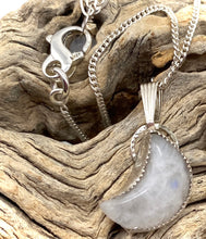 Load image into Gallery viewer, moonstone pendant shown in natural surroundings