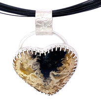 Load image into Gallery viewer, petrified palmwood root pendant