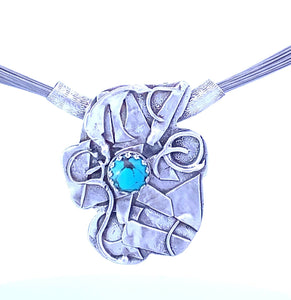freeform sterling turquoise pendant