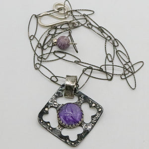 charoite pendant showing the link chain