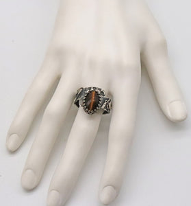 gemstone ring shown on hand