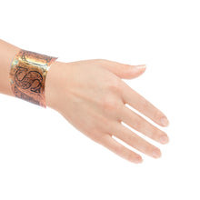 Load image into Gallery viewer, Hand wearing a copper USA cuff bracelet