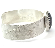 Load image into Gallery viewer, Silver bracelet with textured design on a white background
