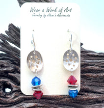 Load image into Gallery viewer, Jewelry card with earrings featuring silver, red, and blue crystals on a wooden background.
