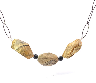 Necklace with stone beads on a white background