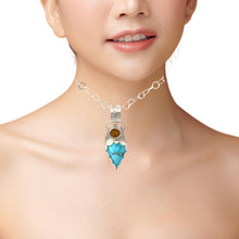 Load image into Gallery viewer, Handmade natural turquoise and citrine pendant worn on a model with a silver chain, showcasing unique craftsmanship.
