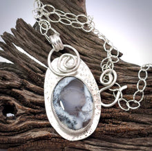 Load image into Gallery viewer, dendritic opal necklace with a pendant on a wooden surface