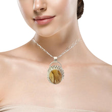 Load image into Gallery viewer, Necklace with a circular pendant worn by a model on a white background