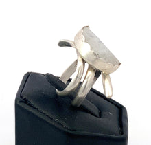 Load image into Gallery viewer, Silver ring with a large stone on a black stand against a white background