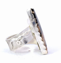 Load image into Gallery viewer, Silver ring with textured design shwon from the side