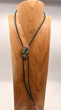 Load image into Gallery viewer, Bolo tie with dichroic glass  on a wooden block 