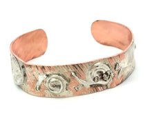 Load image into Gallery viewer, Copper and silver cuff bracelet with engraved designs on a white background