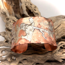 Load image into Gallery viewer, Copper and silver cuff bracelet on a textured surface