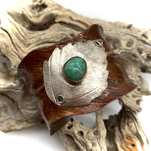 cuff in natural setting. turquoise