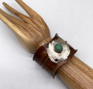 turquoise cuff shown on wrist