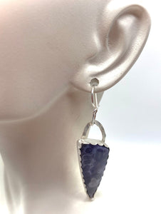 grape agate earring on ear lobe