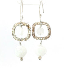 Load image into Gallery viewer, A pair of silver dangle earrings with textured square frames, faceted moonstone gems, 