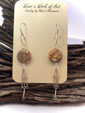 Load image into Gallery viewer, Pair of earrings with stone beads and silver chains on a card, placed on a wooden surface.