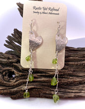 Load image into Gallery viewer, heart shaped peridot earrings shown on romance card