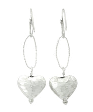 Load image into Gallery viewer, Silver heart-shaped earrings on a white background