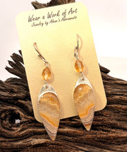 Load image into Gallery viewer, A pair of silver dangle earrings with teardrop-shaped agate stone pendants andfaceted citrine gems displayed on a cream card that reads 'Wear a Work of Art 
