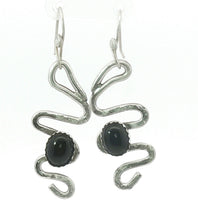 Load image into Gallery viewer, Silver snake-shaped earrings with black onyx  gemstones 