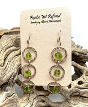 Load image into Gallery viewer, peridot and sterling earrings on romance card