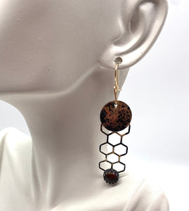 Baltic amber and gold earrings on lobe
