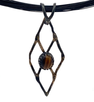 golden steel tigers eye pendant
