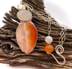 moonstone and carnelian pendant in natural setting