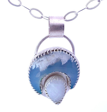 moon shaped plume agate pendant
