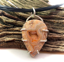 Load image into Gallery viewer, lace agate pendant shown in natural setting