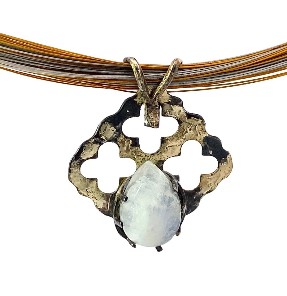 18K gold and steel moonstone pendant
