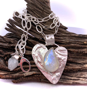 luminous moonstone gemstone heart pendant