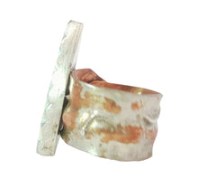 Load image into Gallery viewer, A hammered copper and silver ring with shown from the side 