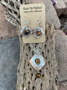 spiiral pendant and matching earrings in tigers eye