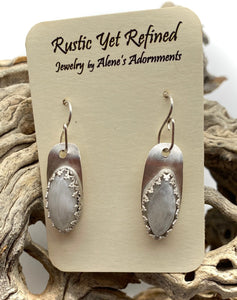 sterling moonstone earrings in natural setting