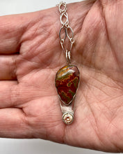 Load image into Gallery viewer, pendant shown in hand for sizing