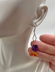 baltic amber earrings on ear lobe