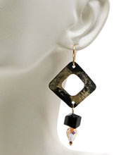 Load image into Gallery viewer, Golden steel earrings on bust