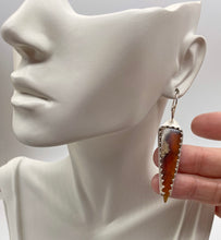 Load image into Gallery viewer, amber earring shown on earlobe