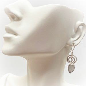 moonstone earring shown on ear lobe