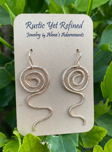 sacred spiral earrings in gold