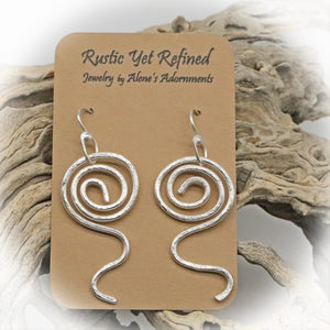 sacred spiral earrings shown on romance card