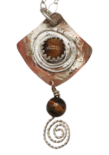 Load image into Gallery viewer, closeup of tigers eye pendant spiral design