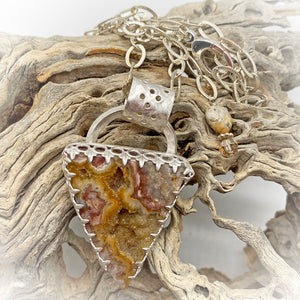 druzy pendant shown innatural setting
