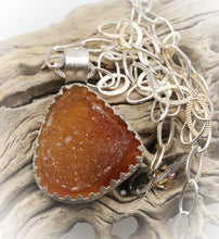Load image into Gallery viewer, druzy pendant shown in nature