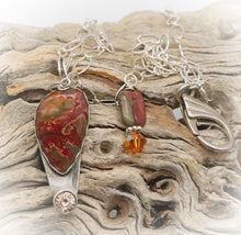 Load image into Gallery viewer, red creek jasper shown in natural setting