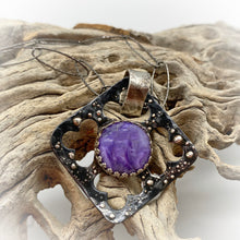 Load image into Gallery viewer, charoite pendant shown in natural setting